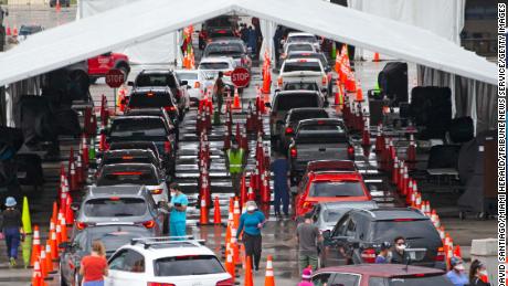 Vehicles line up this month at the Drive-Through Corona virus testing center in Miami Garden, Florida.