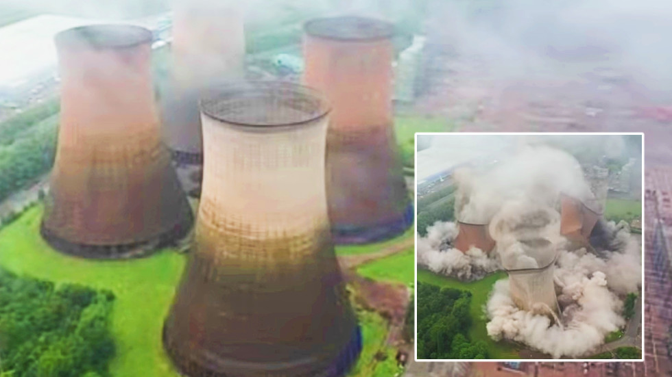 Demolition brings game to a standstill: Football stops before it continues as massive UK power plants collapse in the background (video)