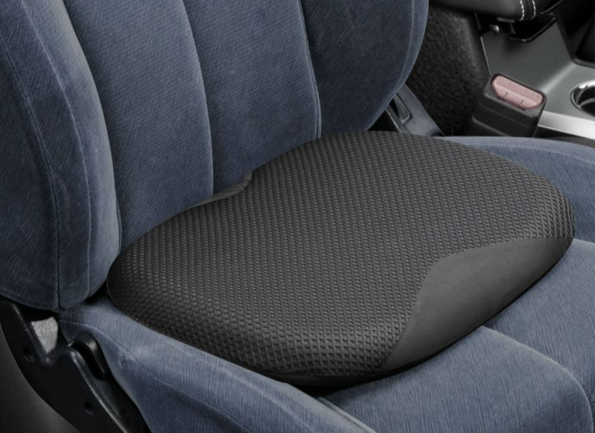 Black Gel Seat Cushion, One of the Best Interior Car Accessories, on Blue Fabric Car Seat